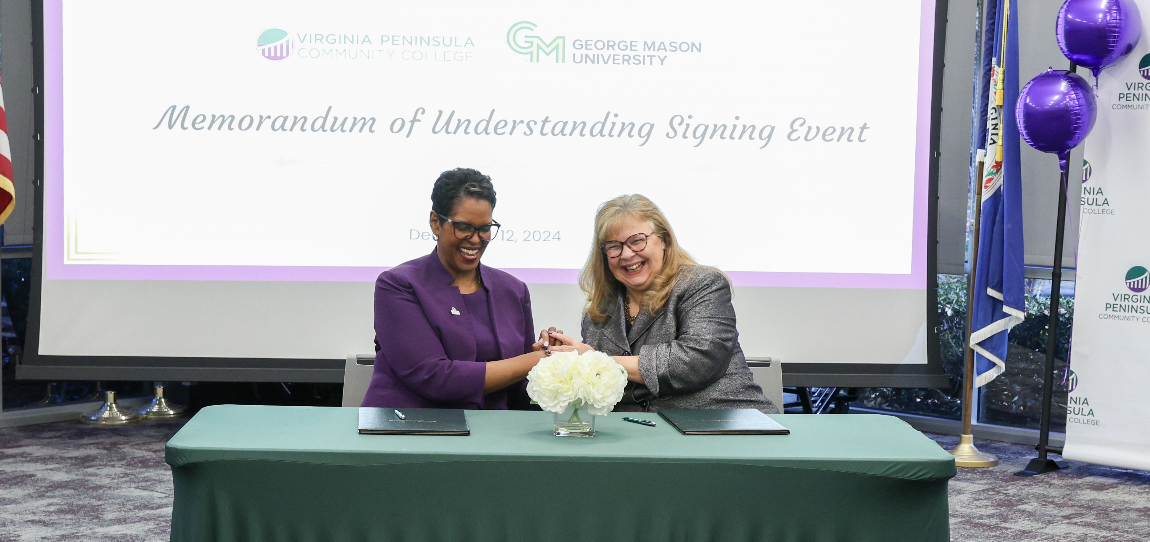 : VPCC President Dr. Towuanna Porter Brannon (left) and Dr. Janette Muir, vice provost at George Mason University, signed an agreement Dec. 12, to make the transition between the two institutions smoother.