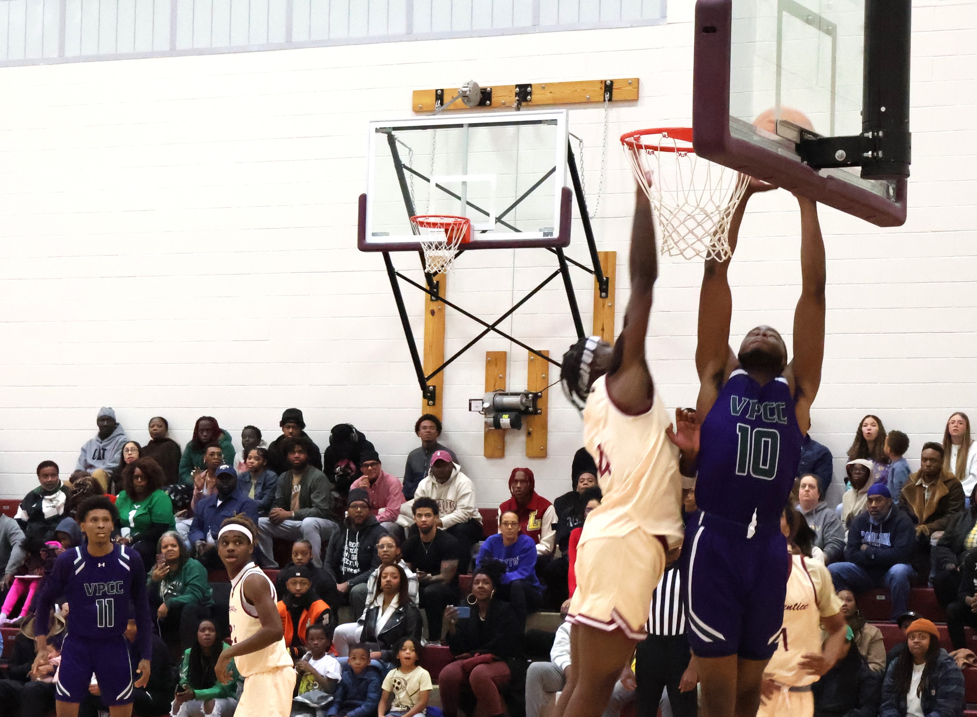 Keshaun Johnson muscles his way for two of his 11 points against the Apprentice School.