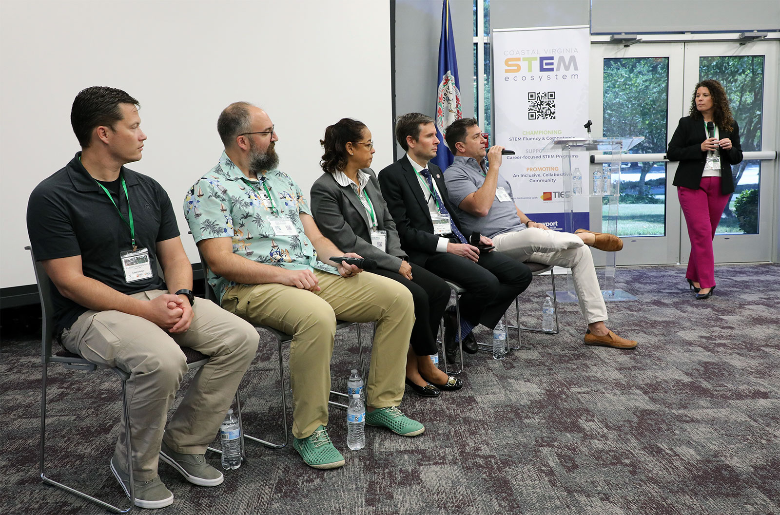 Christa Krohn, the facilitator and keynote speaker, led a panel discussion with, from left, Edward Halper, Ian Taylor, Lisa Surles-Law, Reeve Bull and Jeff Corbett.