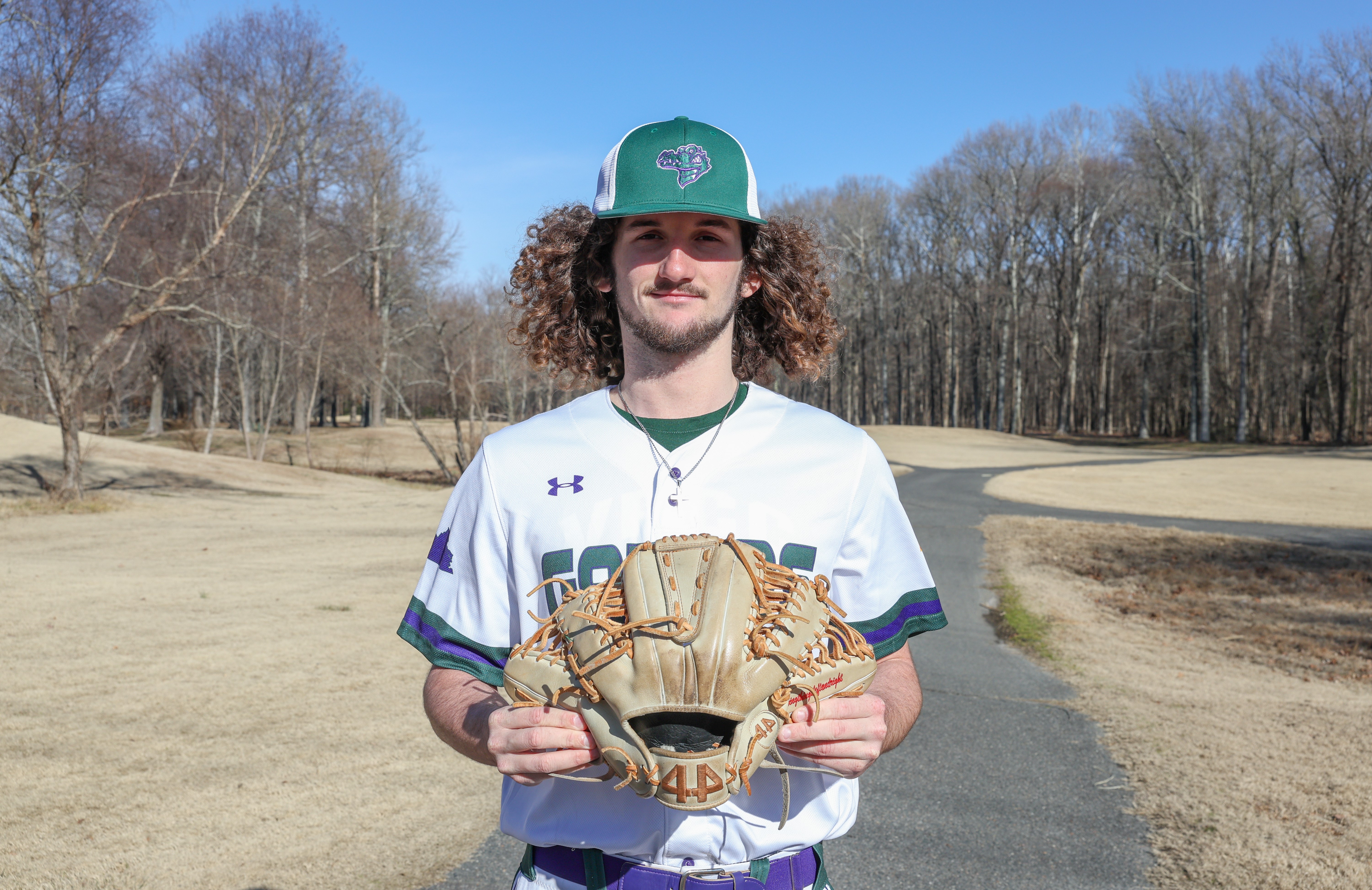 Zack Easton shows off his speciality glove for pitching.