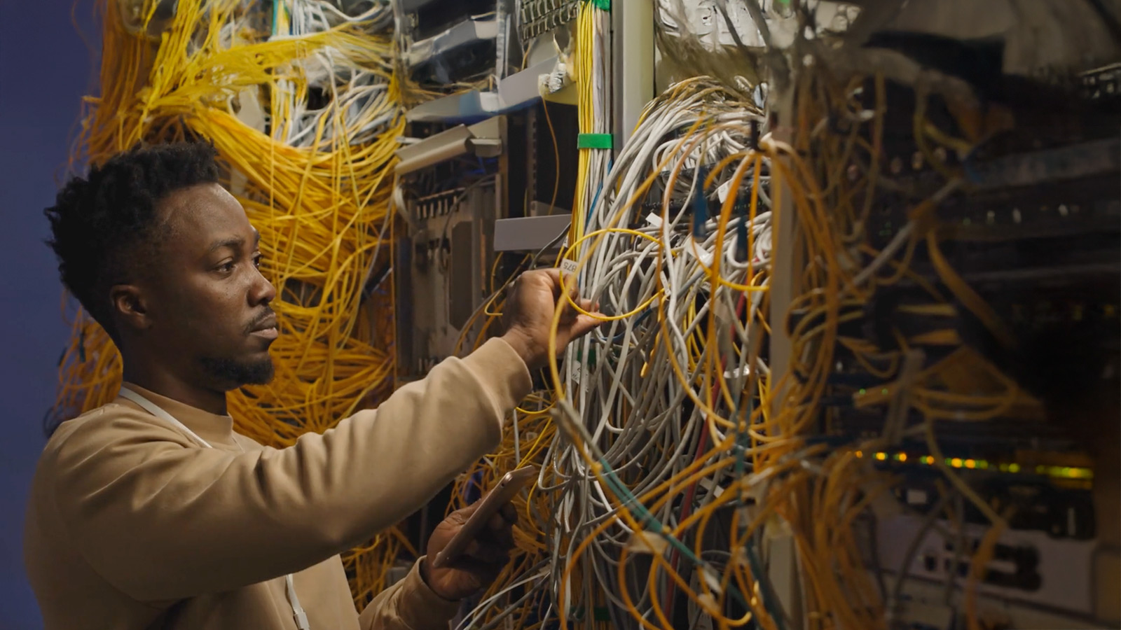 Broadband Fiber Optic Technician at work