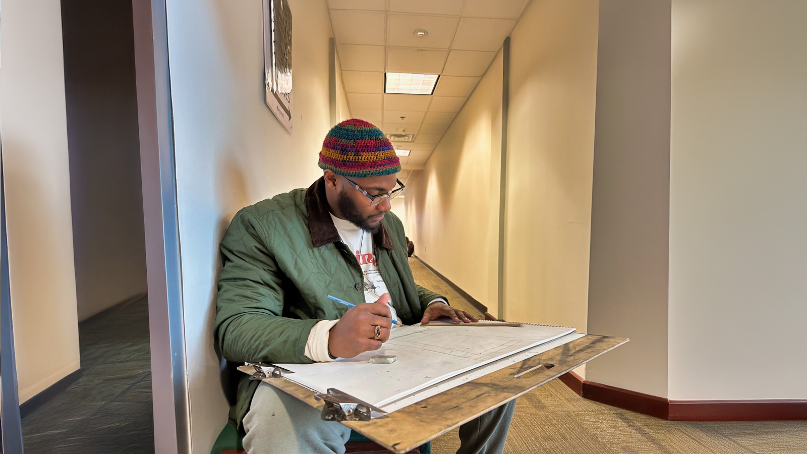 A VPCC student working in a hallway