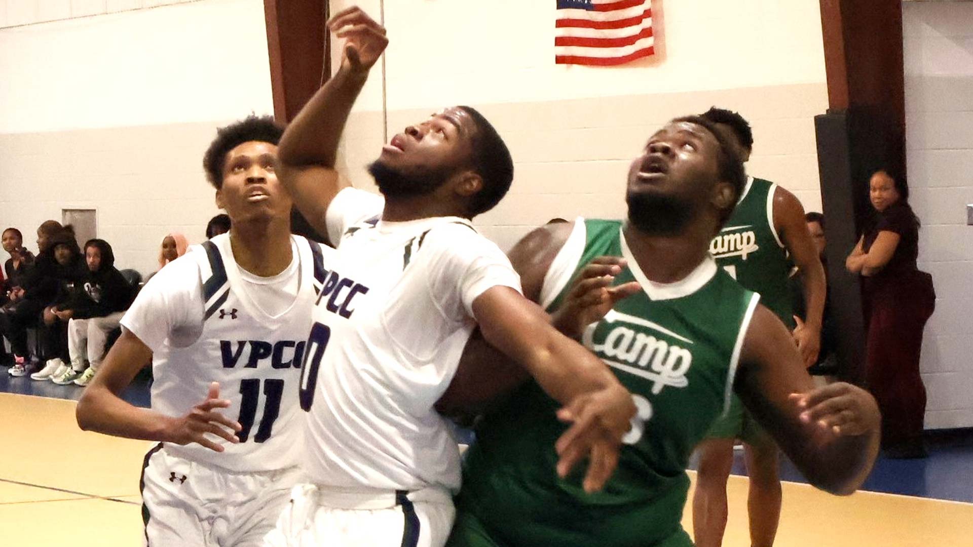 Keshaun Johnson fights for rebounding position against Paul D. Camp Community College.